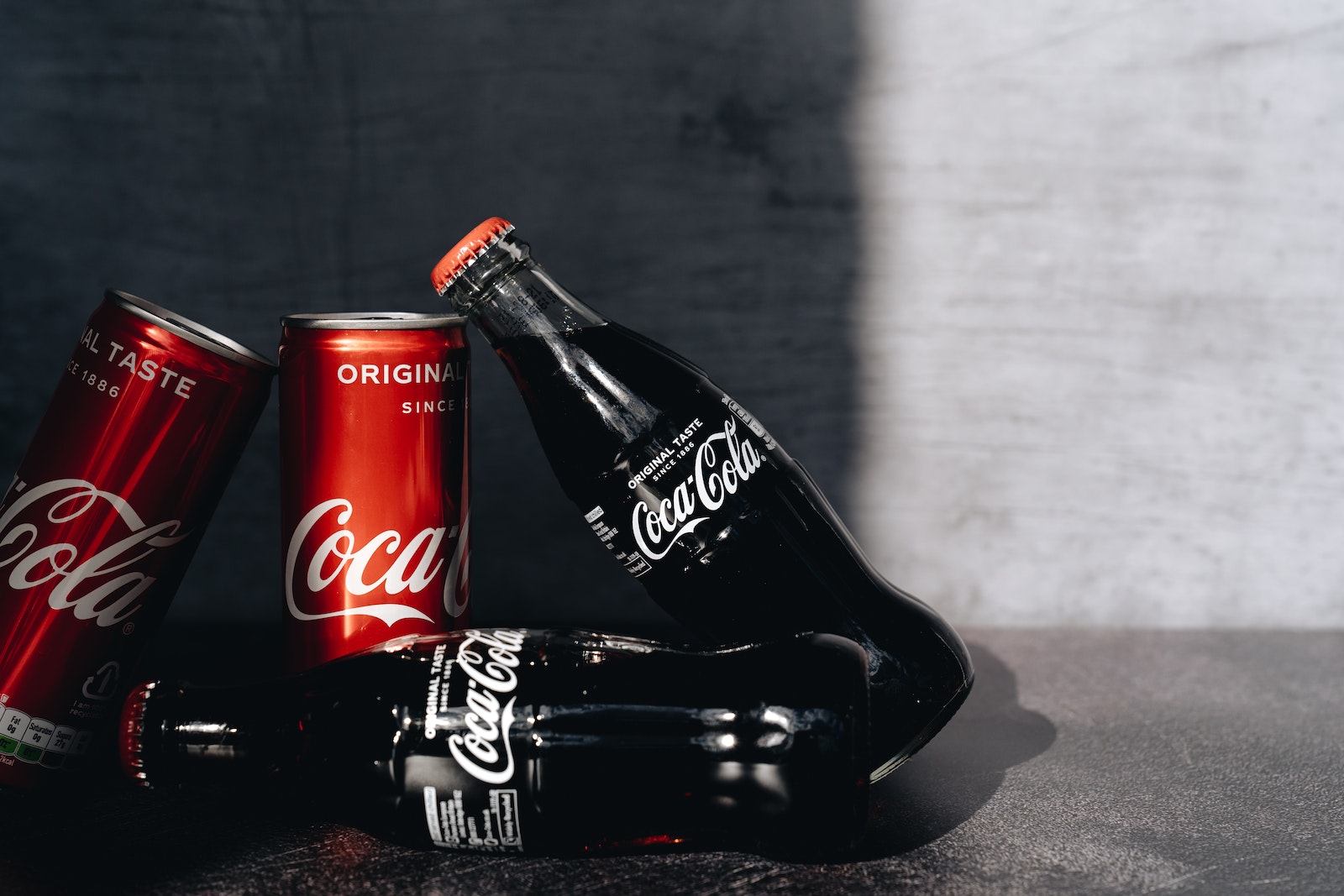 Close-Up Photo Of Canned And Bottled Soft Drinks